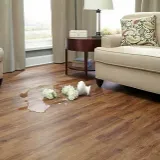 Grey wood plank flooring modern room