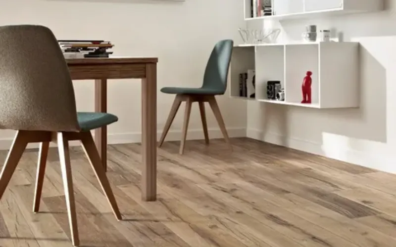 Light wood flooring dining area
